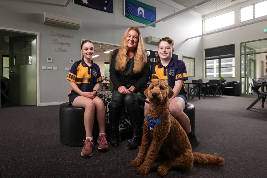 Bandiana Primary School students Eva McKelvey, 12, and Jake White, 11, with Principal Donna Wright and Bandi, welcome the new program. Picture by James Wiltshire