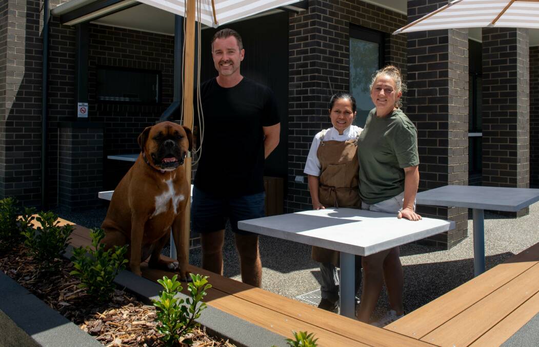 Owners Marianne and Lachlan Breust, head chef Tati Hartati and beloved pet Roxy, the cafe's namesake, are looking forward to opening next week. Picture sby Tara Trewhella