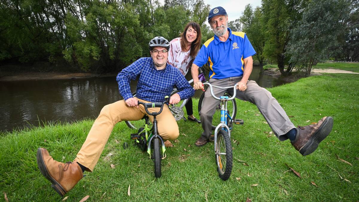 ON YOUR BIKE: Wodonga mayor Kev Poulton, Albury mayor Kylie King and Rotary committee member Stuart Lucas testing out skills for the upcoming event on Sunday. Picture: MARK JESSER