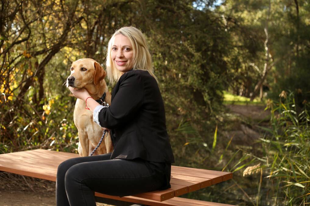 Therapist Anita Geary uses dogs as an effective form of therapy. Picture: JAMES WILTSHIRE.
