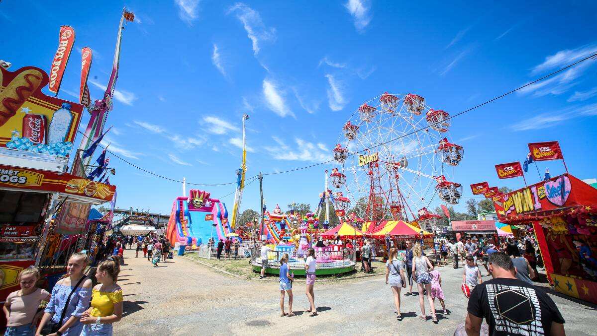 JOY: Amusement rides are a crowd pleaser in Albury but soaring insurance premiums mean some ride operators are having to walk away. Picture: JAMES WILTSHIRE.