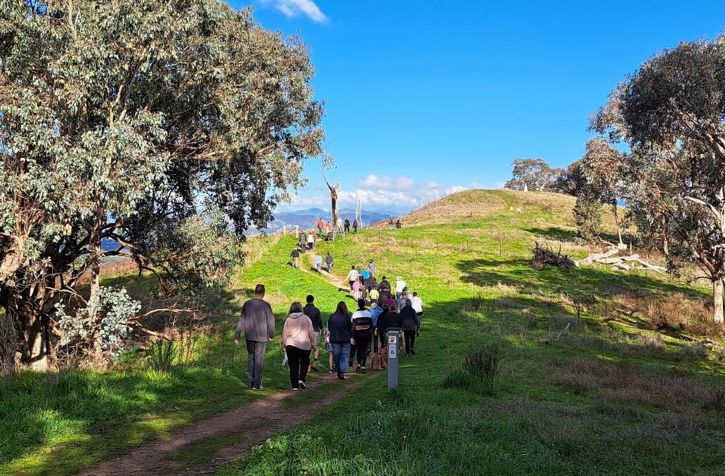 Around 30 people walked Eastern Hill in the walk and talk series to honour the land and pay tribute to the history that still remains. Picture supplied.