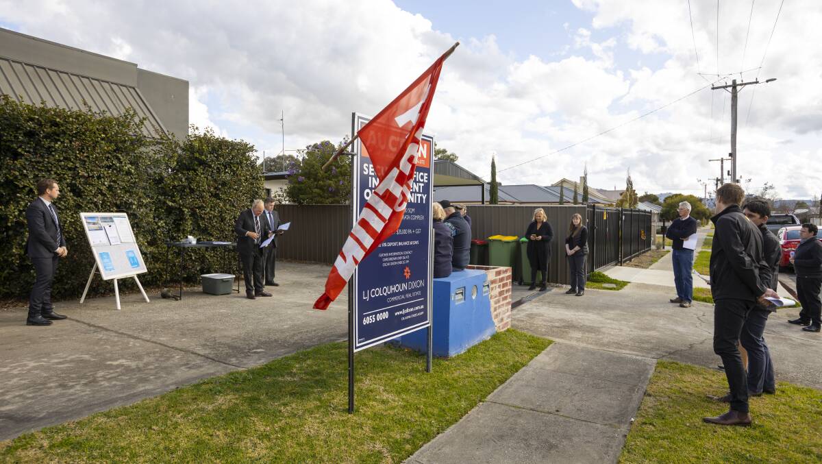SOLD FOR $530,000: About 25 people attended the auction of an office centrally located in Stanley Street, Wodonga, which has a three-year lease with an established business paying $35,000 a year. Picture: ASH SMITH