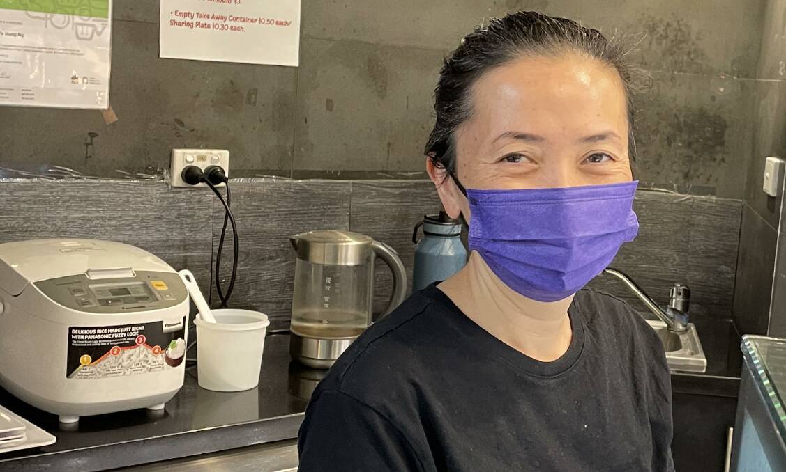 CAUGHT UNAWARES: Wok In owner Lisa Ng says she is prepared for the plastic fork ban in November but was not warned about the plastic bag prohibition.
