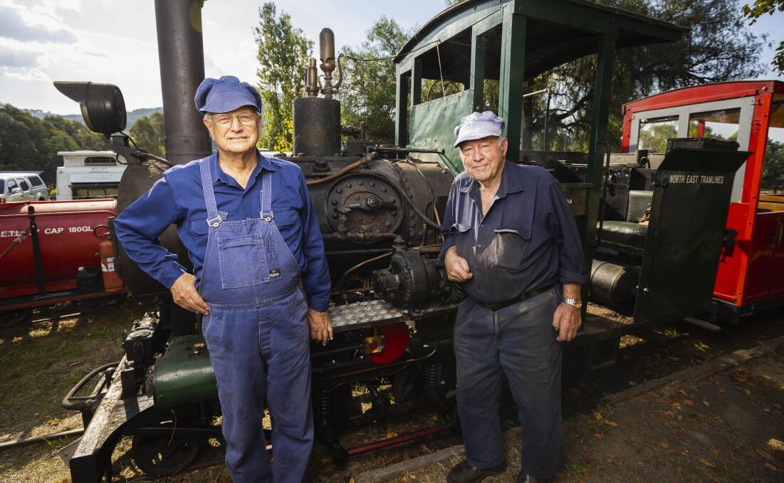 Roy Odgers and Ben Klaster with Engine No. 3, built from parts dating back to 1906. A ride on the classic old loco costs $4. Picture by Ash Smith 