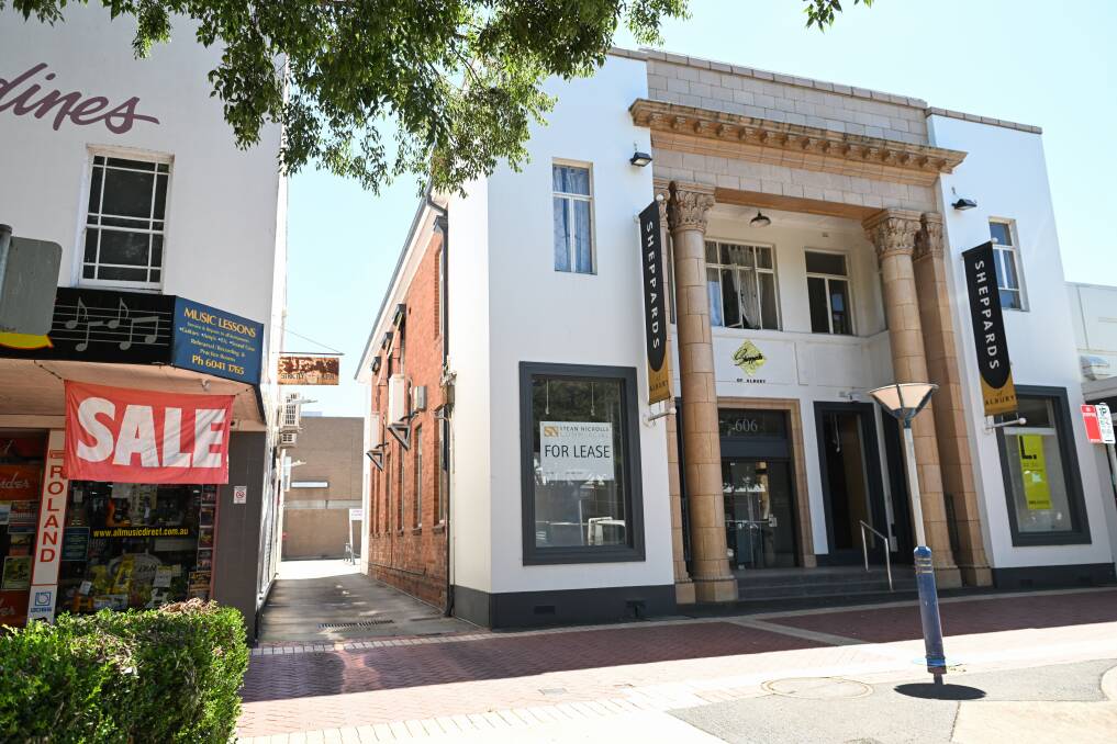 Plans are afoot to build a five-storey apartment tower behind the old National Australia Bank building next to All-Music on 606 Dean Street, Albury. Picture by Mark Jesser