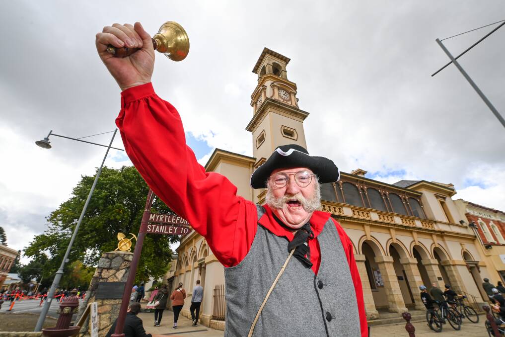 Town crier Ian Sinclair said he wasn't officially part of the parade this year but was just along to "make a lot of noise". Picture by Mark Jesser