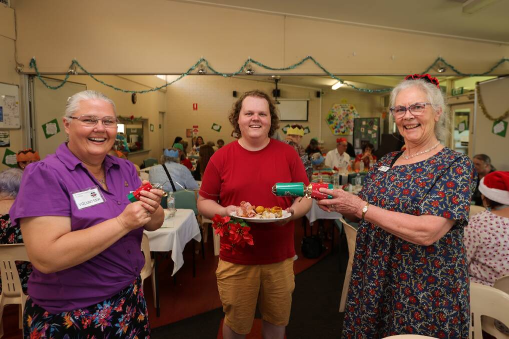 Volunteers Susan Wragg, Kelvin Godde, and Christmas lunch coordinator Helen Collins at St Stephens. Picture by James Wiltshire