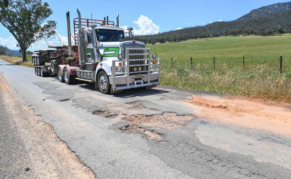 Potholes are seen around every bend on Shelley Road heading south from Walwa. Picture by Mark Jesser