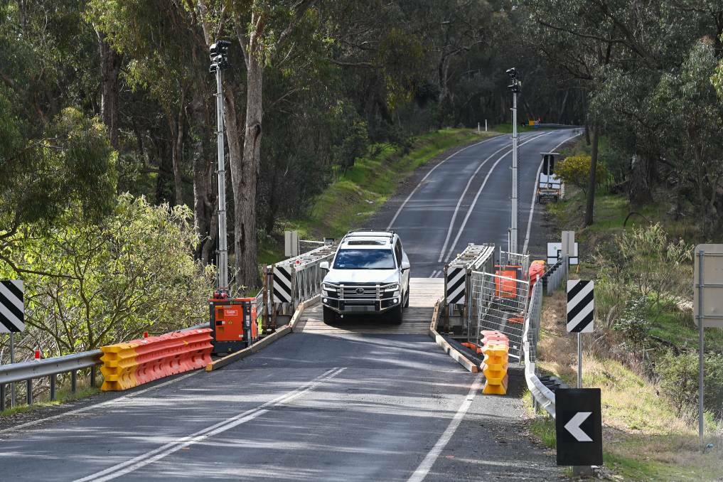 The temporary bridge over the Rising Sun Creek on Beechworth-Wodonga Road. Work is still ongoing "until further notice". Picture by Mark Jesser