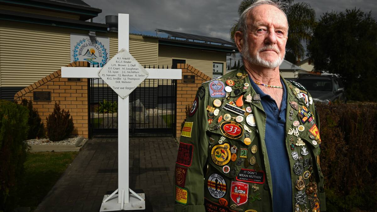 BADGES OF HONOUR: War vet Bob Grigg with his multi-coloured shirt at Vietnam Veterans' Day, an event he says draws bittersweet feelings. Picture: MARK JESSER