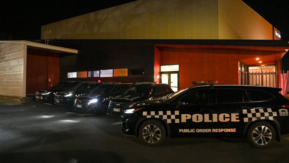 Five police vehicles were parked at the rear of The Cube on Tuesday night. Picture by Mark Jesser
