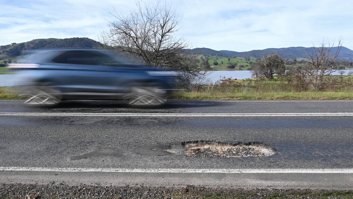 Potholes along a stretch of the Murray Valley Highway at Huon. Picture by Mark Jesser