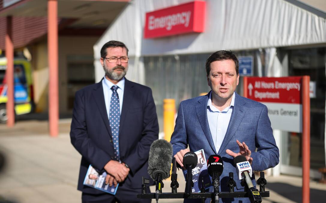 COLLABORATION 'THE KEY': Victorian Opposition leader Matthew Guy with Benambra MP Bill Tilley, left, want funding cooperation from NSW and the federal government for a new Border hospital. Picture: JAMES WILTSHIRE 