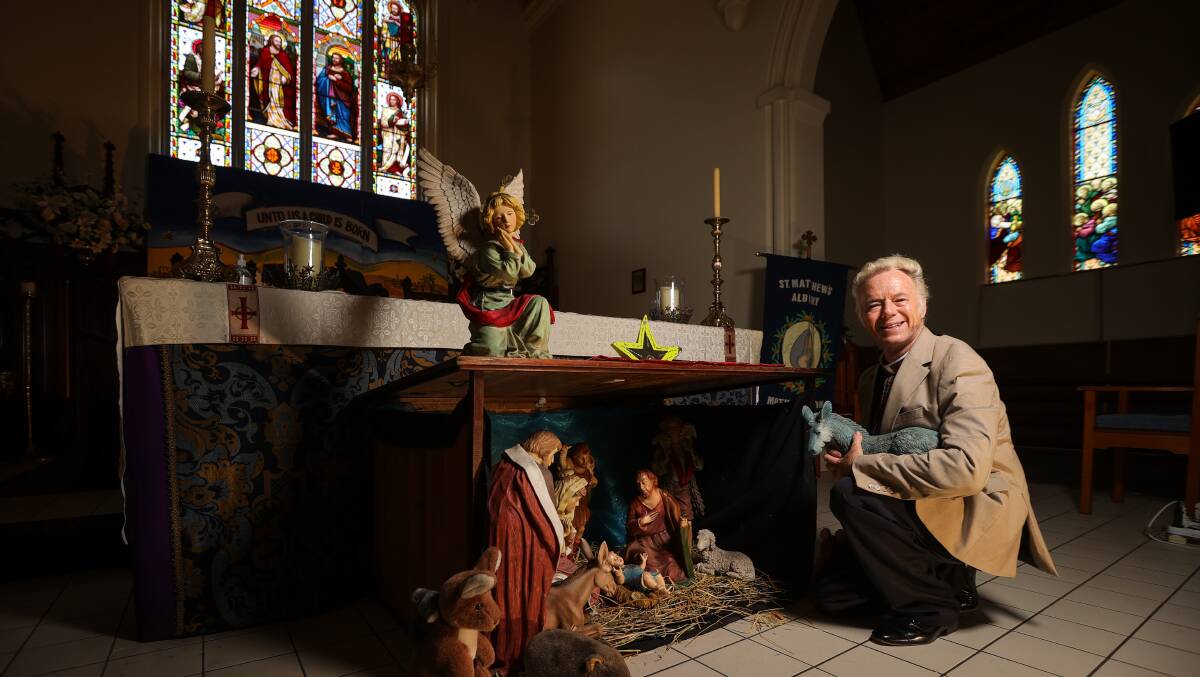 Father Peter MacLeod-Miller of St Matthews Church in Albury was delighted when missing nativity figures reappeared on Christmas Eve. Picture by James Wiltshire