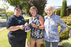 Volunteer Rescue Association volunteer Courtney Hawke with Tracey Larkings, of Glen Innes, and Albury resident Norma McBrien at the Good Friday Appeal on March 29. Picture by Mark Jesser
