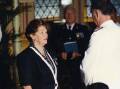 Pam Stone is awarded a Medal of the Order of Australia by Governor of New South Wales Peter Sinclair in 1994. Picture: The Stone family in Australia