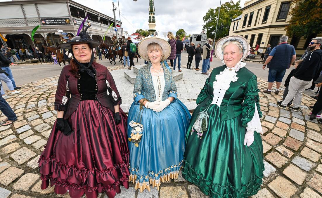 Sharon Kurrle, Cheryl Keylock and Ute Jeffcott show off recreations of 1850s hoop dresses. Picture by Mark Jesser