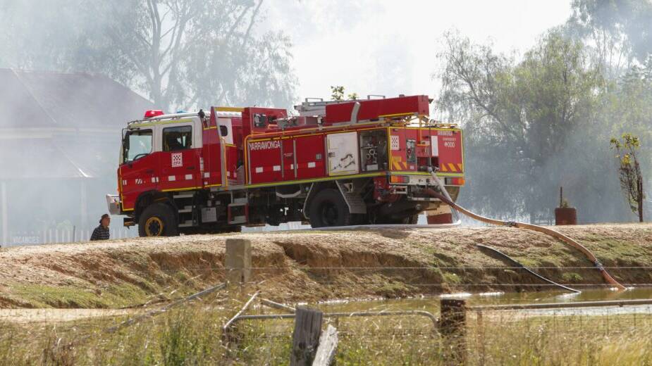 Yarrawonga firies attend a century-old home that was gutted during a major blaze in May, 2021. File picture