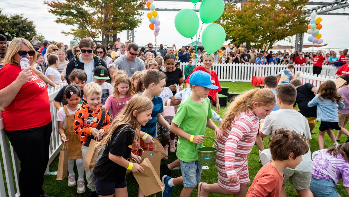 SCRAMBLING FOR FUN: This year's Easter egg hunt drew thousands of young and old to take part in Good Friday frolics where these was a huge array of activities. Picture: Isaac Wishart