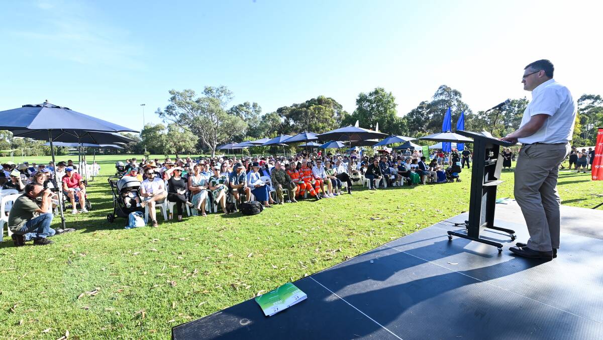 Wodonga Australian Day Committee chairman Kev Poulton addresses the crowd at Willow Park on Australia Day morning. Picture by Mark Jesser