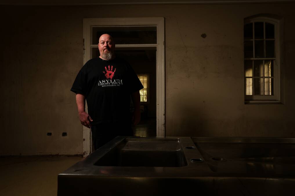 Beechworth Asylum Ghost Tours co-director Geoff Brown stands in the room where a photograph, which has since gone 'viral', was taken on Saturday night. Picture by James Wiltshire.
