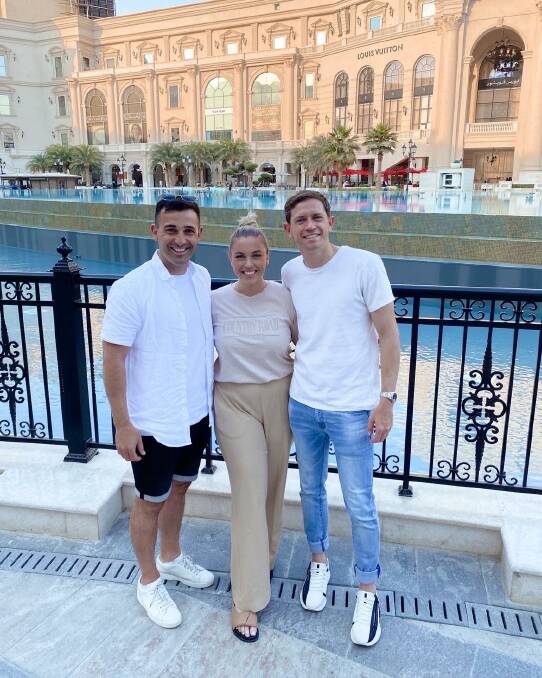 David Afonso with Katelyn and Craig Goodwin in Doha. Picture supplied 