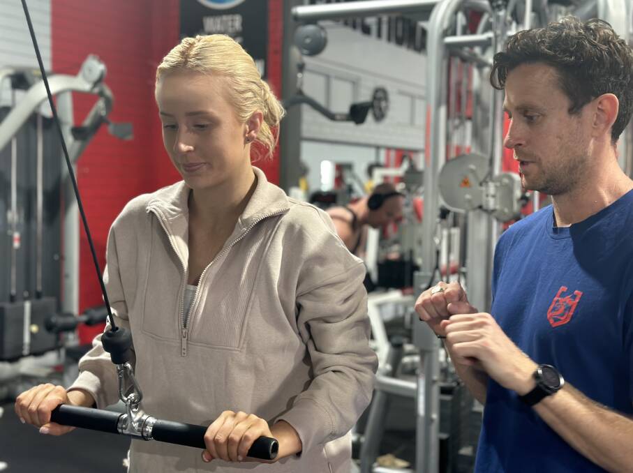 Griffith TAFE fitness teacher Jared Kahlefeldt, with fitness student Haylee Miller, says incorporating a mental health unit in next years fitness courses will ensure future Griffith fitness instructors are better attuned to their clients needs. Picture supplied 