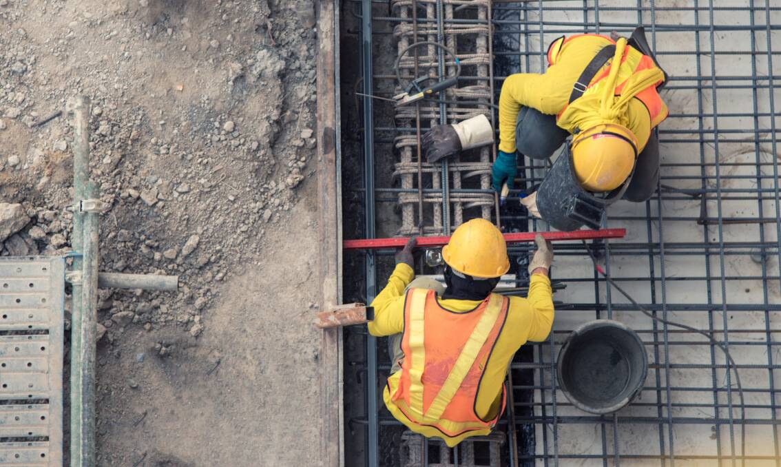 Aerial view of construction workers. Picture from Shutterstock