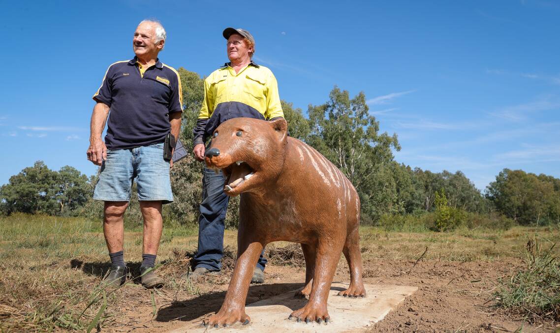 Wayne Bishop from Parklands Albury Wodonga is pictured with sculptor Kevin Ennis. Picture by James Wiltshire