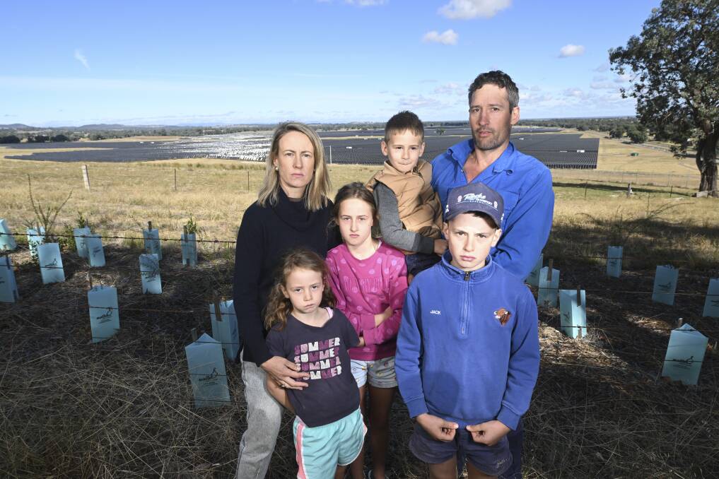 Meadow Creek beef farmer John Conroy, pictured with wife Jess Conroy and children Isla, 7, Anna, 9, Will, 4, and Jack, 11, fear a solar farm will destroy their farming community. Picture by Mark Jesser