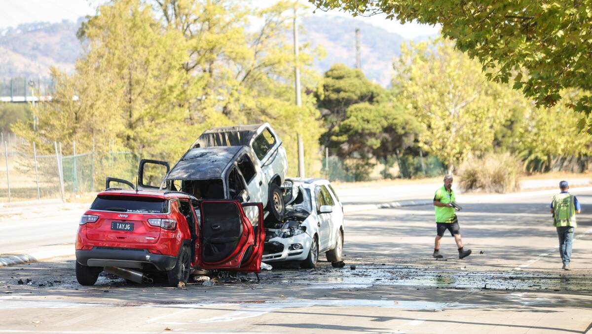 A red Jeep collided with a white dual cab ute on Young Street on Saturday, March 23, which then caused damage to two other vehicles. Picture by James Wiltshire 