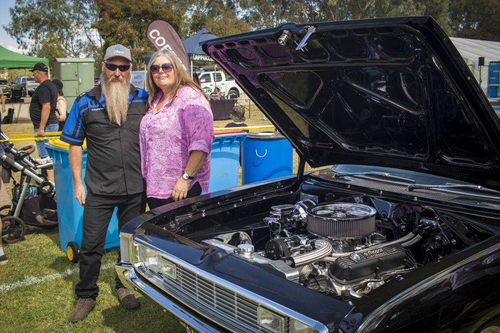 Faye and Glenn Watts from Yambuk, Victoria, with their 1971 VH Valiant wagon. Picture by Layton Holley