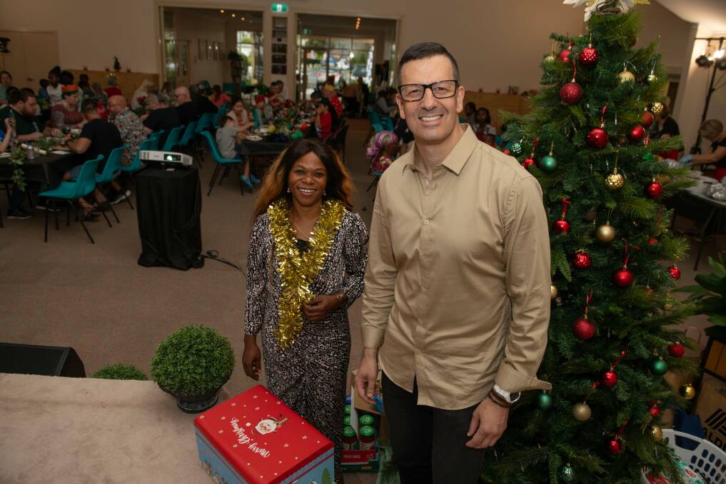 Volunteer Faida Kashindi and Gateway Life Church pastor Jason Mannering said they were blessed to be able to offer a family atmosphere on Christmas Day. Picture by Tara Trewhella