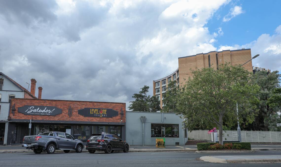 The two buildings occupied by Saludos, Level One Cellars and Thai Puka will be demolished to make way for the proposed $25 million apartment complex. Picture by James Wiltshire