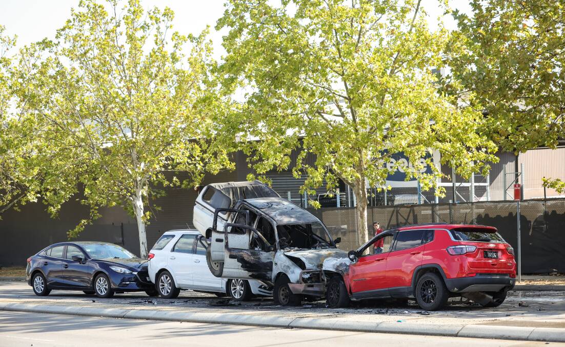 A white ute had its back wheels lifted off the ground in the crash on Young Street on Saturday, March 23. Picture by James Wiltshire