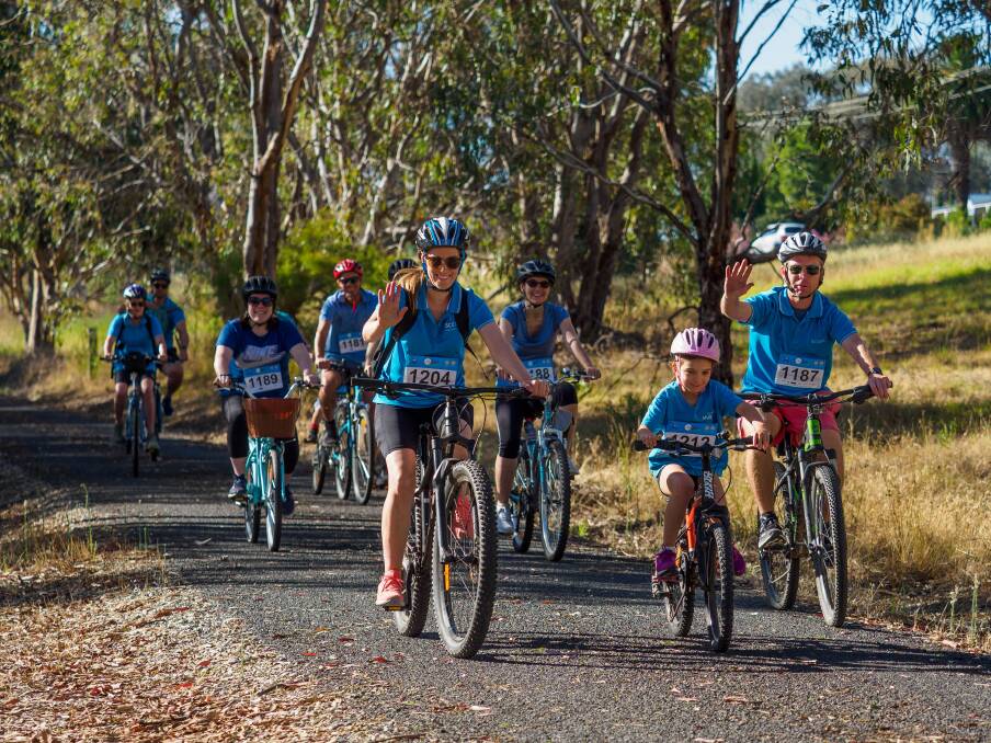 Families riding in the 14km Kiewa River Family Ride. Picture by Ben Eyles