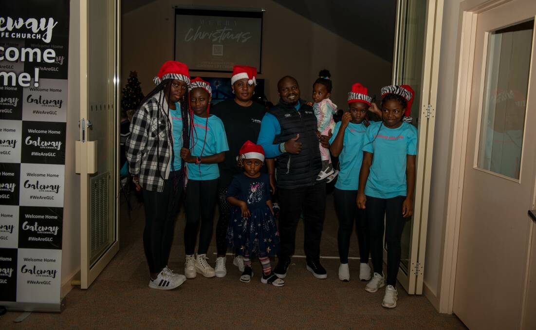 Matthew Kambale and his family moved to Australia as refugees three months ago. He said the church and community made him feel at home on Christmas. Picture by Tara Trewhella