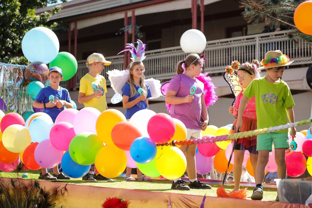 Students from Lowesdale Public School on their Carnival-themed float. Picture by James Wiltshire