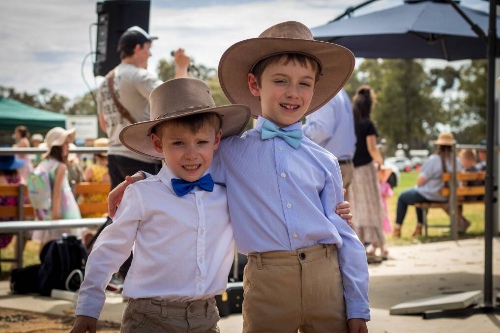 Theo Bakes, 5, and his brother Ryder, 6, competed in the showgirl/boy competition, although they were more interested in the crafts and chickens. Picture by Layton Holley