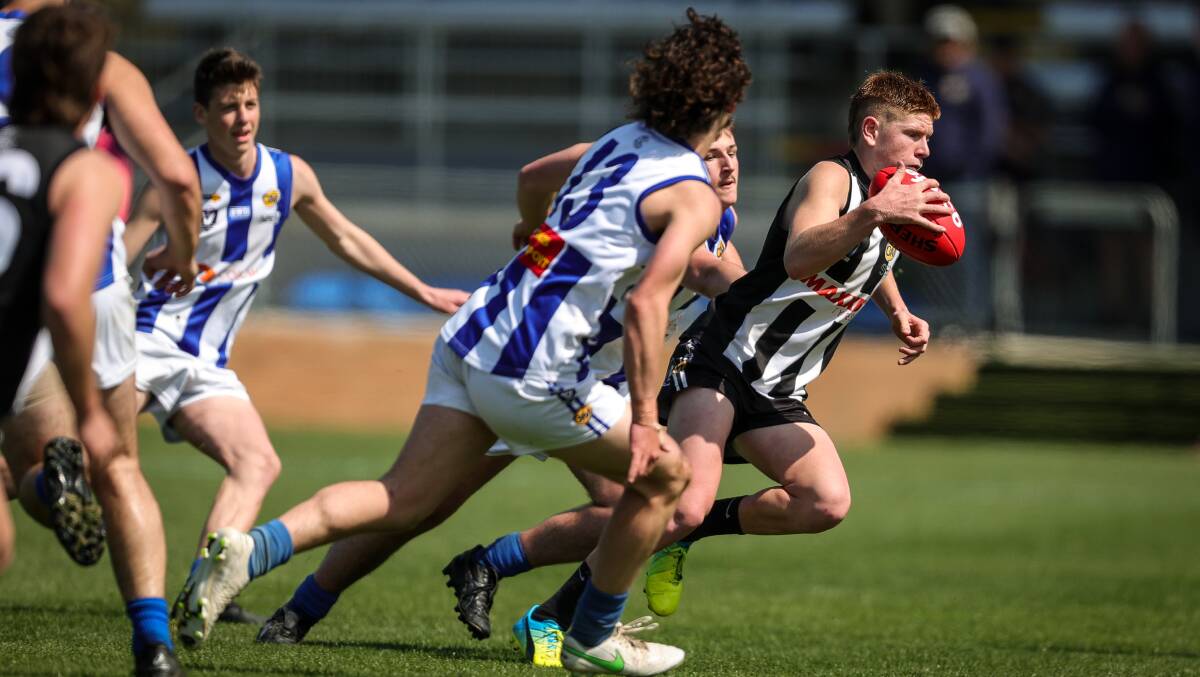 Charley Holland-Dean in action in the O&M thirds grand final last year.