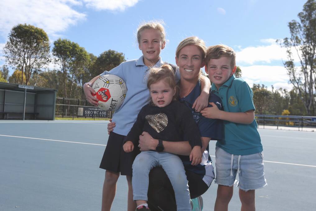 Yarrawonga netballer Kylie Leslie with her children Lily, Jimmy, and Annie back in 2021 when she reached 200 A-grade games for the Pigeons.