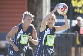 Yarrawonga wing defence Gemma Grimmond and goal defence Kylie Leslie in action during the Pigeon's win against Albury Tigers on Saturday. Picture by Mark Jesser.