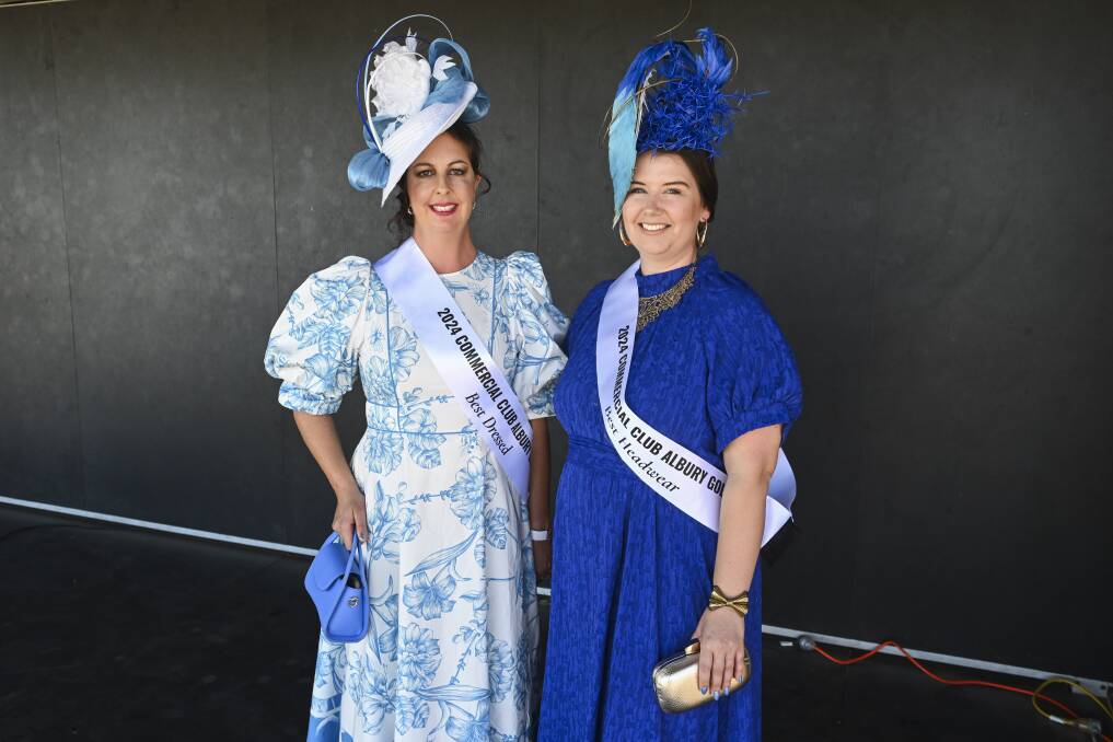 Best Dressed winner Nancy Naughtin, of Corowa, and Best Headwear winner Amy Wallace, of Wodonga, shone in their shades of blue. Picture by Mark Jesser