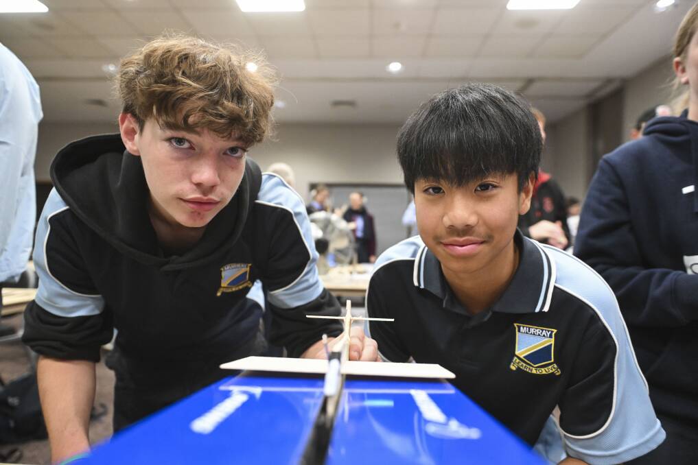 Year 10 Murray High School students Oscar Hartwig and Quoc Vu, both 15, set themselves the challenge of making their plane fly the furthest. Picture by Mark Jesser