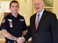 Constable Zach Rolfe in April, 2019 received the Royal Humane Society's highest bravery award from then governor-general Peter Cosgrove for rescuing two tourists from a flood-swollen river in the Northern Territory. Picture: Supplied