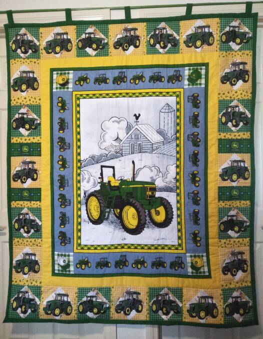 MADE WITH PURPOSE: This quilt will help support farmers in drought. It was made by people from the eastern Riverina. Picture: Supplied