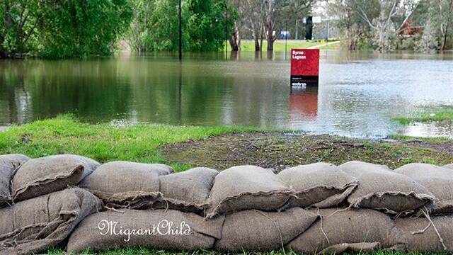 PHOTO OF THE DAY: @migrantchild "Flooding getting pretty serious on the causeway near Albury / Wodonga. #floods #albury #wodonga #bordermail #thisistheborder #sandbags #murrayriver"