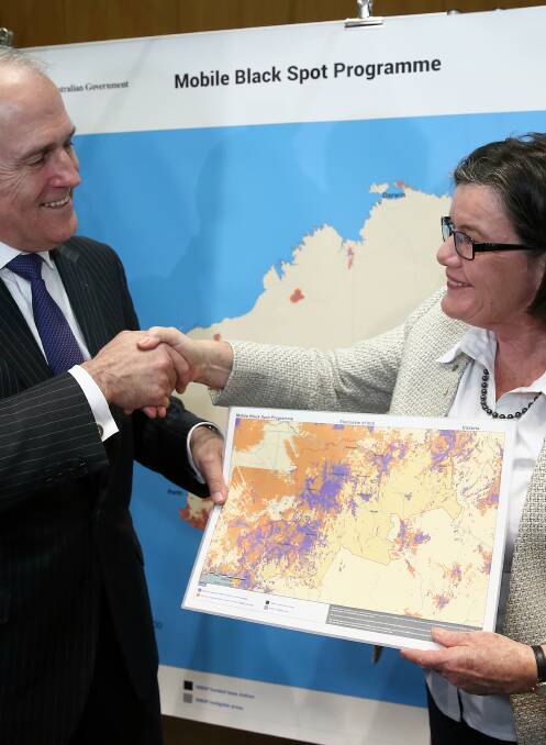 MARKING THE SPOT: Indi MP Cathy McGowan discusses mobile phone black spots with then-Communications Minister Malcolm Turnbull in June 2015. Picture: ALEX ELLINGHAUSEN