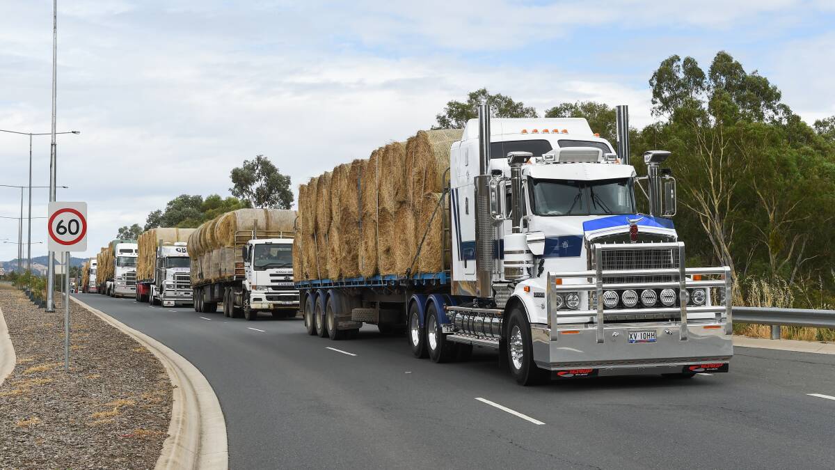 Trucks involved in the Timboon hay drive on the way to Corryong.